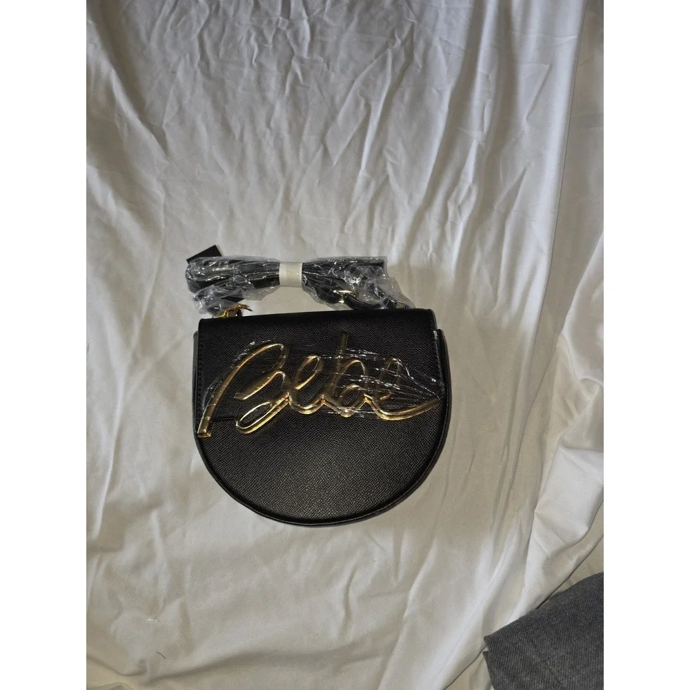 BeBe NWT Gabriel Saddle Bag. Black‎ And Gold